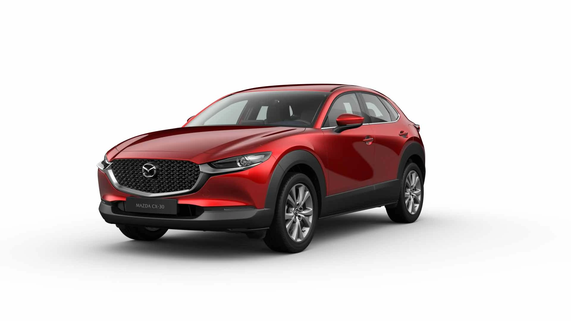 Mazda CX-30 roja vista en ángulo frontal lateral sobre fondo blanco, con diseño deportivo y compacto.
