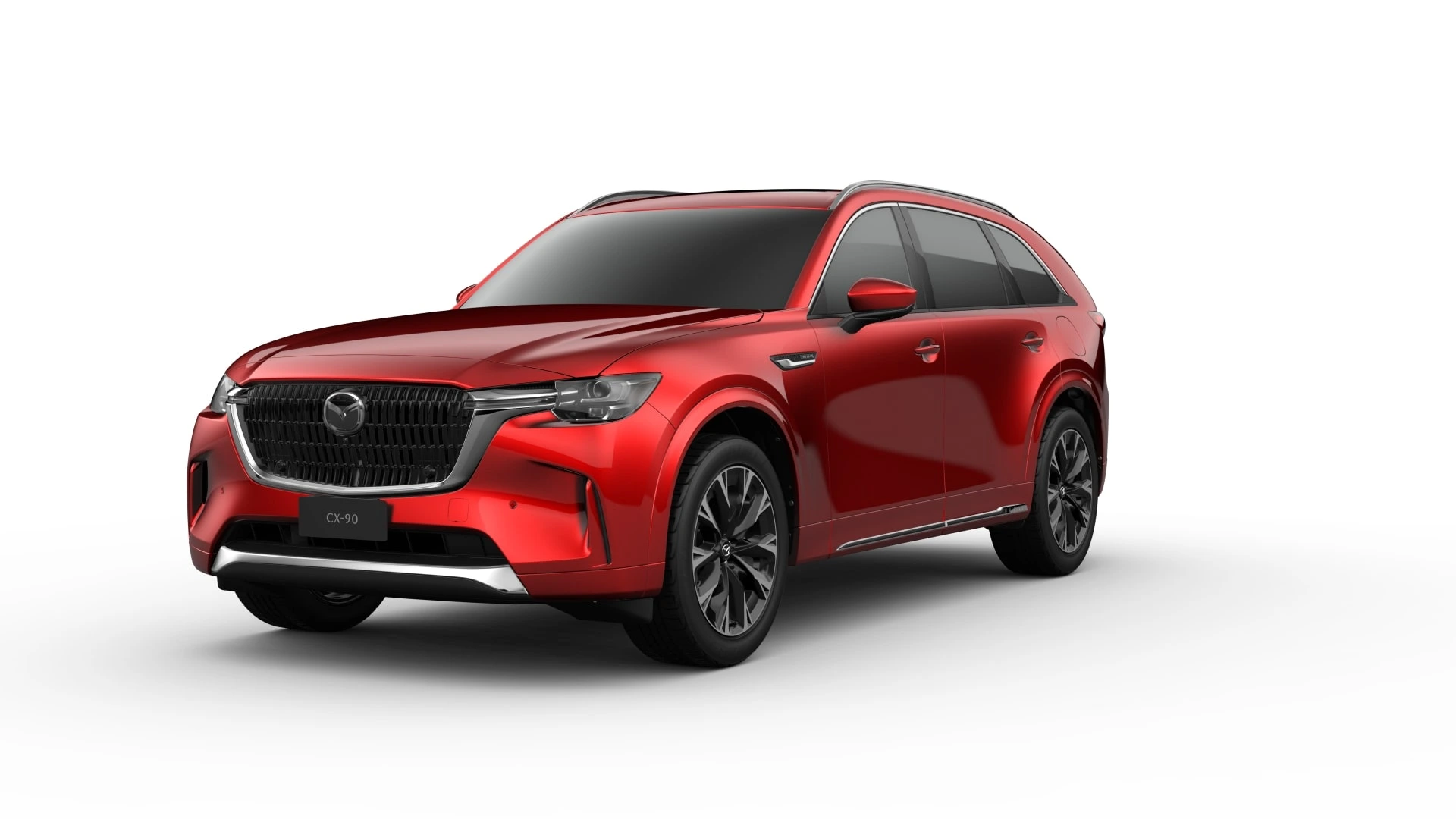 Mazda CX-90 en rojo Soul Red Crystal vista frontal lateral sobre fondo blanco, SUV de lujo con tres filas de asientos.